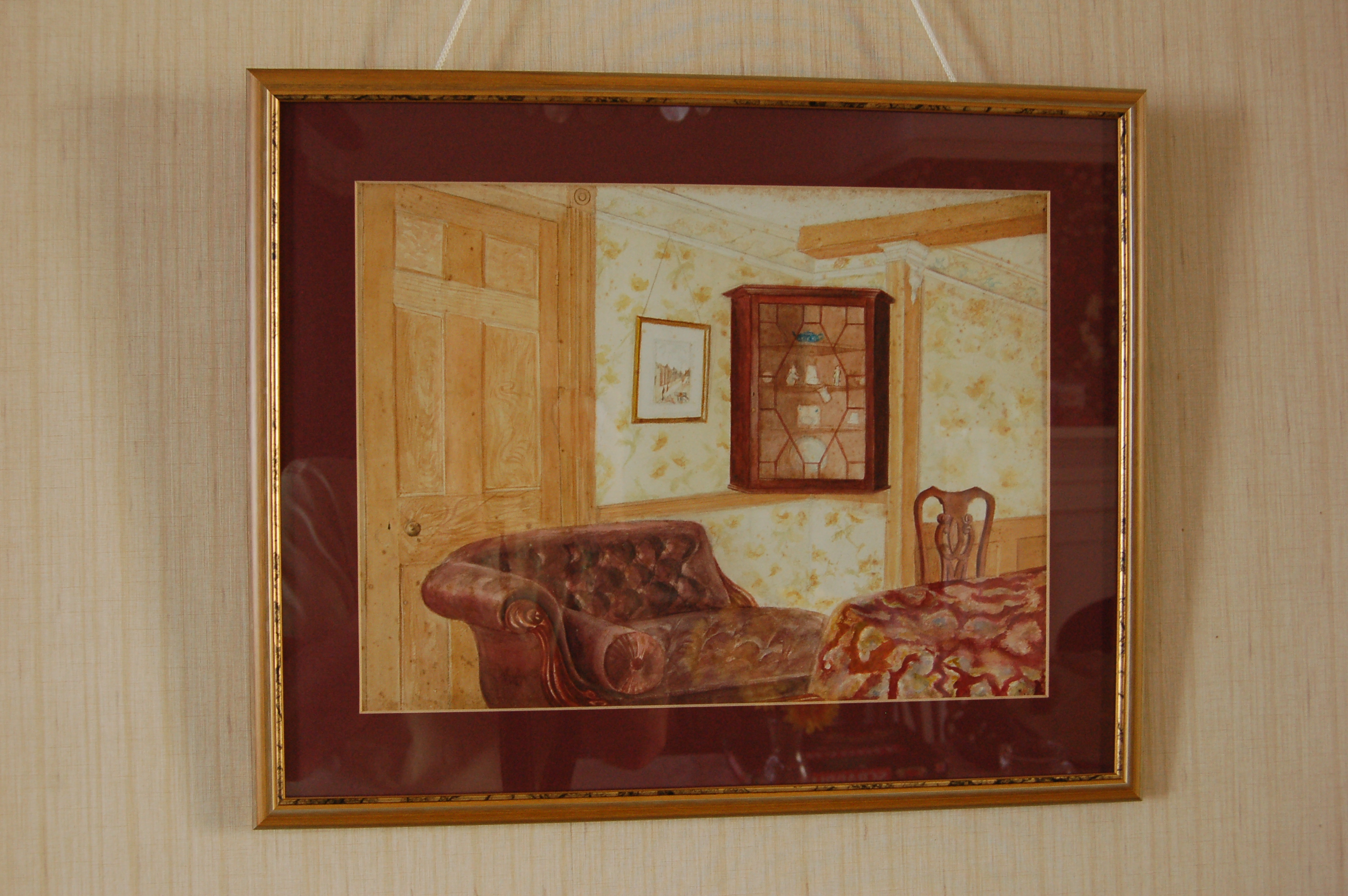 Picture by Elsie Nora Bearman hanging in Beachcrest in 2010, dated 1900 showing the interior of the front room there. The table and corner cabinet were sadly stolen not many years ago.